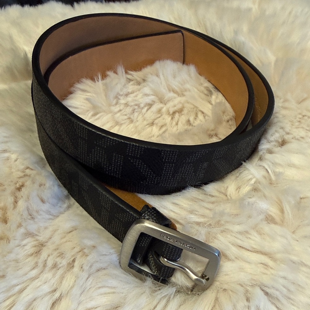 Michael Kors monogram belt with a signature "MK" logo buckle.